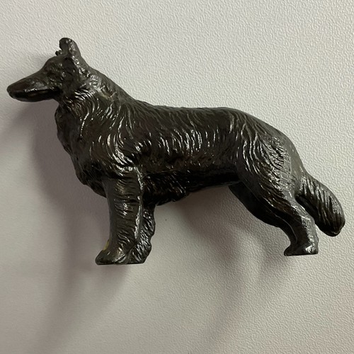 Vintage cast metal rough coat - metal,